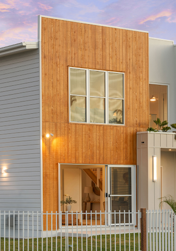 Bold exterior timber facade with modern wood cladding in expressive architectural design