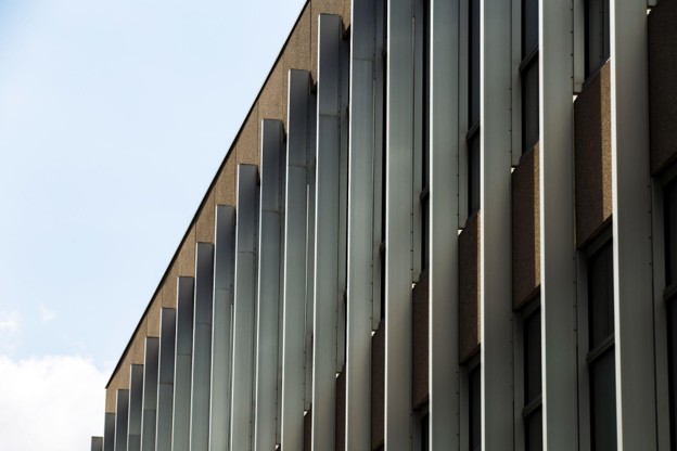 Commercial building facade featuring powder-coated aluminium louvers
