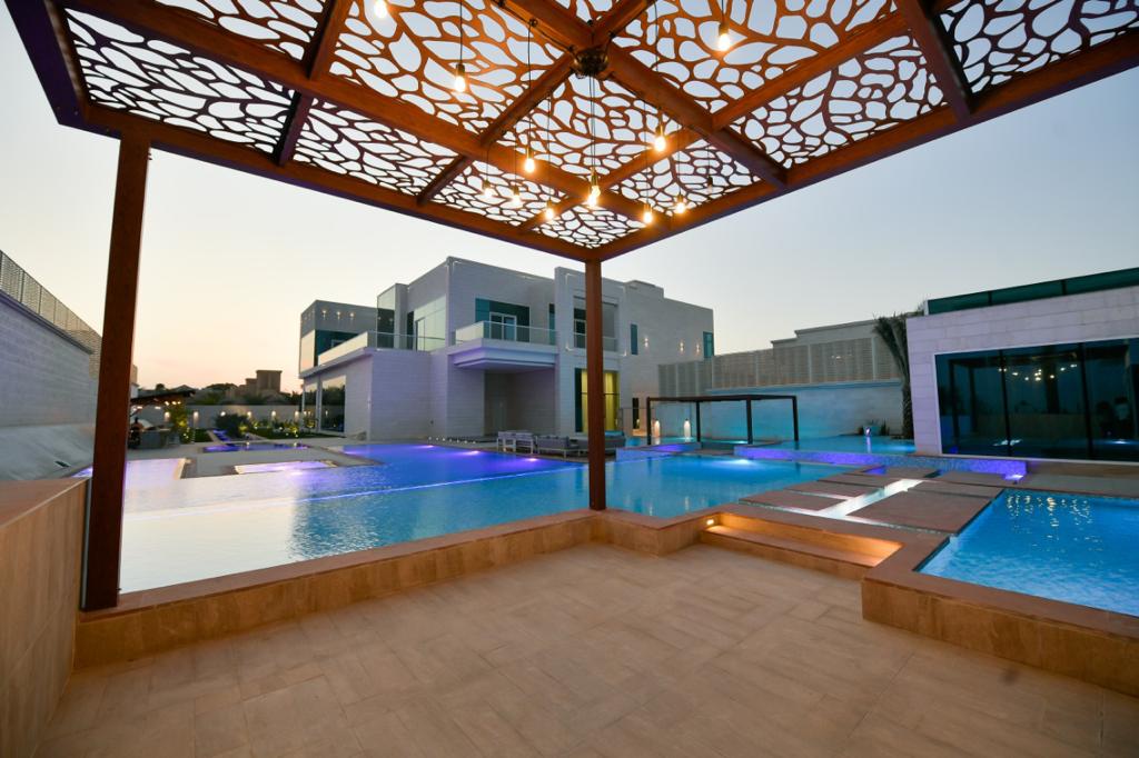 Weathertex clad pergolas on a villa pool terrace in Nad Al Sheba, Dubai