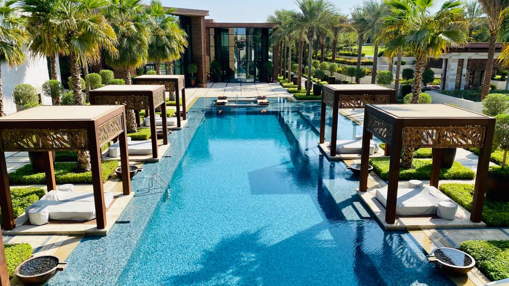 Weathertex cabana pergolas and Jaali screens around a private pool in Dubai